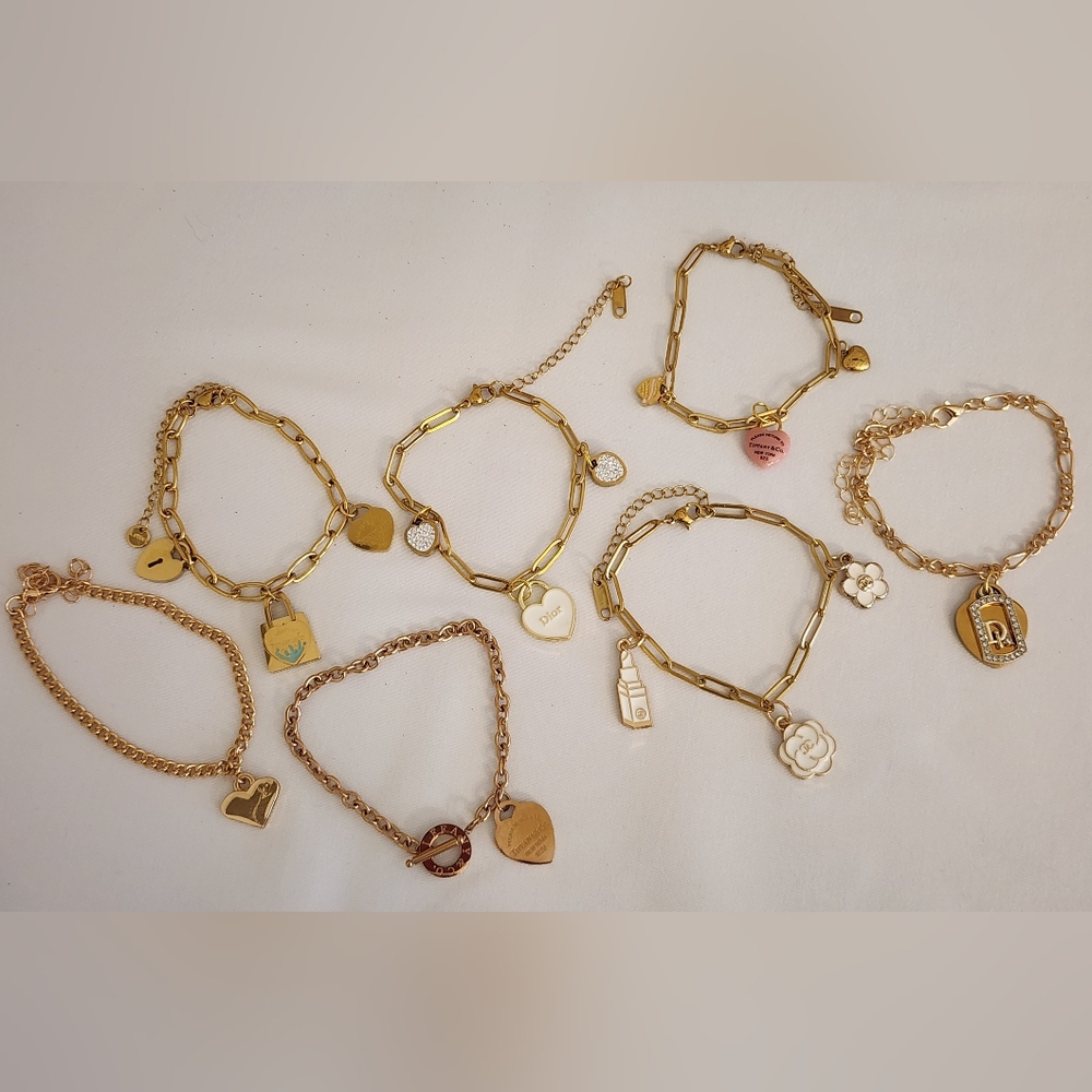 Chic Gold and Pink Charm Bracelet Collection